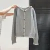 Chaqueta de punto gruesa con botones de colores para mujer Otoño e Invierno 2025 Estilo perezoso Diseño holgado Cárdigan de manga larga