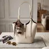 Bolso cruzado para mujer 2026 Diseño de nicho Bolso de axila francés Bolso de mano de alta gama Bolso de hombro retro a la moda para el trabajo
