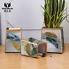 Fábrica de macetas de patrón autoabsorbente de lujo ligero moderno de hoja caduca al por mayor maceta de suelo grande nueva para sala de estar personalización