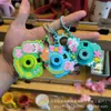 Llavero de Cámara de Proyección de Dibujos Animados Sanrio Colgante para Bolso Juguete para Niños Colgante Luminoso Pequeño Regalo Venta al por Mayor