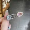 Clip para el cabello de estilo coreano Dongdaemun Rosa con Pedrería Perlas Alrededor Hueco Accesorios para el Cabello de la Frente Lado Primavera/Verano 2026 Nuevo