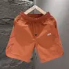 Shorts de cordón versátiles de tendencia de lujo ligero, dopamina, verano 2026, ligeros, transpirables, de moda, holgados, de secado rápido, para la playa