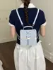 Mochila Casual Yuezi de Nicho com Laço para Mulheres 2026 Novo Modelo Estilo Universitário Mochila Escolar Fofa Mochila de Viagem