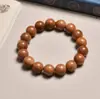 Pulsera de madera de melocotonero vieja natural, artículo cultural de madera auténtico, cuentas de oración protectoras, pulsera de un solo bucle para hombres y mujeres
