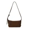 Versão Coreana Bolsa de Mão Estilo Baguete Retro de Nicho para Mulheres Inverno 2025 Nova Bolsa Elegante de Ombro Único Transversal de Alta Qualidade