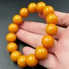 Pulsera de Cera de Abejas al por Mayor Pulsera de Cuentas Redondas de Cera Artificial Pulsera de Cera de Abejas Color Amarillo Pollo