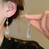 Aretes Redondos Chinos Nuevos Electrochapados en Oro Real con Zirconia Exquisitos Elegantes Elegantes Gancho para la Oreja Sentido Avanzado Aretes Simples al por Mayor