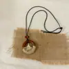 Nova Colar com Pingente de Borla Geométrica Chinesa Estilo Étnico Design de Nicho Corrente Longa para Suéter Ornamento de Colar Moderno Versátil para Mulheres