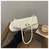 Bolso baguette moderno y de moda, nuevo modelo verano 2026, versátil, alto valor estético, color liso, bolso de mano para ir al trabajo para mujer