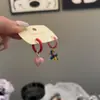 Corea del Sur Dongdaemun Globos de Amor Esmaltados de Colores Hebilla de Oreja de Perro Pendientes de Corazón Dulce y Femenino Pendientes Texturizados