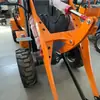 Pequeno Carregador, Carregador Hidráulico Multifuncional com Tração nas Quatro Rodas, Trator de Esteira de Engenharia, Pegador Agrícola para Madeira e Grama