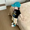 Traje Infantil 2026 Verano Nueva Moda Casual Versátil para Niños Dibujos Animados Unicornio Manga Corta Bebé Pantalones Cortos Florales