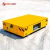 Vehículo sin orugas de 1 tonelada con ruedas de goma y control remoto, plataforma plana alimentada por batería de litio, patas hidráulicas, elevación y retracción manual