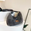 Bolso de Hombro de Mezclilla Nuevo para Mujer Transfronterizo, Bolso Simple de Mezclilla Tipo Dumpling, Bolso para Estudiantes Universitarios de Tutoría al por Mayor