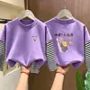 Nova Camiseta de Manga Longa 100% Algodão para Meninas Primavera/Outono 2026 Patchwork Listrado Moda Falsa Duas Peças para Crianças Médias e Grandes