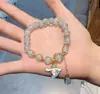 Pulsera Explosiva con Perlas, Versátil Perro Canela Sanrio Kuromi Dibujo Animado Mejor Amiga Estudiante, Otra Pulsera al por Mayor