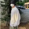 Suéter de punto para hombre de moda 2026 con cuello de solapa, Tejido versátil de color liso, Suéter de punto suelto y casual estilo Hong Kong para parejas