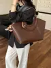 Bolso de hombro tejido para commuter transfronterizo, bolso de mano de diseño simple de nicho, bolso cruzado casual versátil para el uso diario