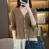 Nuevo estilo de verano cárdigan de punto de algodón puro con rayas verticales, mangas tres cuartos, chaqueta de color liso con cuello en V estilo coreano, top hueco de color liso para mujer