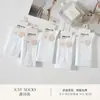 Série Xin Shiyu Outono e Inverno Novo Estilo Meia de Algodão Espessa All-In-One de Cano Médio, Meias Lisas de Ponto Duplo Perfumadas, Modernas e Versáteis