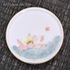 Posavasos de cerámica dorada pintado a mano, creativo portavasos de porcelana blanca dulce, juego de té con aislamiento térmico, accesorios para ceremonia del té de kung fu para el hogar