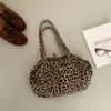 Bolso tote de estampado de leopardo para otoño e invierno transfronterizo, bolsa de mano de gran capacidad de moda para mujer, bolso de mano y bandolera de estilo coreano de moda de nicho para mujer