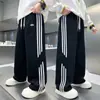 Calça Masculina Primavera e Outono 2025 Nova Calça de Treino Infantil de Outono para Meninos Mais Velhos Perna Reta Calça de Moletom Tendência