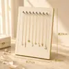 Soporte de exhibición de terciopelo negro y dorado para aretes y collares con múltiples ranuras, tablero de exhibición de almacenamiento de joyas, soporte de exhibición para mostrador de joyería