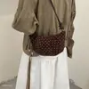 Bolsa pequeña bolsa para ir al trabajo modelo nuevo teléfono móvil cuerno nicho retro para mujer de un solo hombro cruzada de moda otoño e invierno lunares 2026