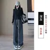 Pantalones de mujer de pierna ancha, holgados, a la moda y casuales, de cintura alta, con finas rayas, bolsillos y un diseño de pierna recta y fluido, hechos de terciopelo de algodón, para otoño e invierno 2026