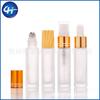 Venta al por mayor 5ml 10ml vidrio esmerilado tapa de madera grano botella de bola botella roll-on cosmético aceite esencial perfume sub-botella