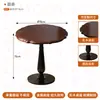 Mesa redonda de madera maciza estilo panadería con sillas tapizadas, diseño minimalista, adecuada para cafeterías, mesas de reuniones, sillas de comedor, ocio moderno y entornos de té de la tarde