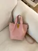 Bolsa Balde Retrô de Nicho Estilo Coreano 2026 Nova Moda Bolsa de Mão de Alto Valor Simples para Ombro e Transversal