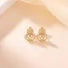 Pendientes Yilu de Plata de Ley S925 Chapados en Oro con Forma de Calabaza y Lazo, Elegantes y Versátiles para el Trabajo, Accesorios Diarios Únicos y Compactos