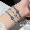 ¡Cuerda colorida con diamantes brillantes! Pulsera de vid de uva tejida, diseño de nicho de lujo ligero, sensación exquisita y de alta gama, accesorio de mano versátil