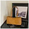 Bolso de mano vintage estilo coreano para mujer, nuevo bolso de hombro de moda de nicho para el día a día, bolso de axila moderno de alta apariencia