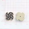 ABS estilo coreano blanco y negro trébol de cuatro hojas DIY pegamento de crema accesorios para joyería pequeños accesorios pendientes pasador de pelo agujero material para zapatos
