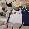 Vestido de niña clase a verano nuevo algodón combinación de colores falda chaleco falda larga recta para niña primera generación de pelo