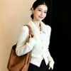 Chaqueta de punto tipo cárdigan con solapa de dos piezas falsas para mujer, nuevo estilo Otoño/Invierno, cárdigan de punto con lazo de encaje, top corto
