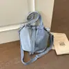 Bolso cuadrado pequeño de moda para mujer, nuevo modelo primavera-verano 2026, diseño de nicho, alto valor estético, elegante bolso cruzado y de hombro para el día a día