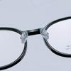 Armazón de gafas de titanio puro 6g al por mayor redondo TR90 tamaño pequeño armazón de gafas con chapado IP armazón de titanio transparente libro rojo pequeño 9882