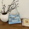 Bolso de hombro con cadena para mujer, nueva moda primavera 2026, bolso de hombro único retro de alta gama, bolso cruzado para el día a día