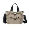 Bolsa minimalista de nylon estilo japonês para mulheres, bolsa transversal moderna, bolsa de ombro de alta aparência, bolsa de mão estilo workwear, bolsa tote leve
