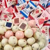 Bolas de yogur de chocolate con relleno de arándanos y espino cerval Keli Guo en paquetes pequeños, artículos de Año Nuevo, caramelos, snacks a granel al por mayor