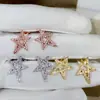 Elegantes pendientes de lujo de alta gama con forma de estrella asimétrica de cinco puntas, pendientes creativos de estrella con circonita brillante