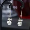 Brincos pingente geométricos criativos coreanos laço joia de diamante temperamento feminino nicho brincos de metal à vista