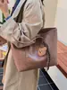 Yue Zi 2026 Otoño/Invierno Nuevo Retro para Viajes al Trabajo Gran Capacidad Alta Apariencia Elegante Bolso Tote Casual Bolso de Hombro