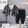 Fabricantes Mayoristas de Ropa de Primavera de Manga Larga para Niños Transfronterizos Conjunto de Tres Piezas Cardigan Rayado Elegante para Niño Nuevo Estilo Primavera y Otoño 2025