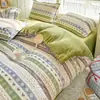 Juego de ropa de cama de cuatro piezas grueso y cálido, terciopelo de leche de alto gramaje, nuevo estilo 2026, diseño fresco y minimalista, juego de sábanas de tres piezas