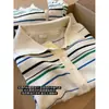 Tricô Listrado com Gola Polo Retrô Feminino 2026 Novo Outono Solto Casual Versátil Estilo Coreano Estilo Academy Top